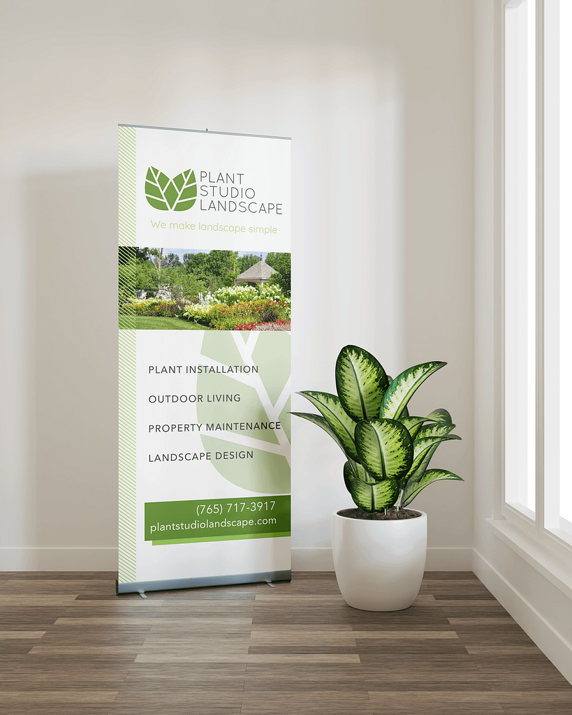 retractable banner in bright room with green graphics